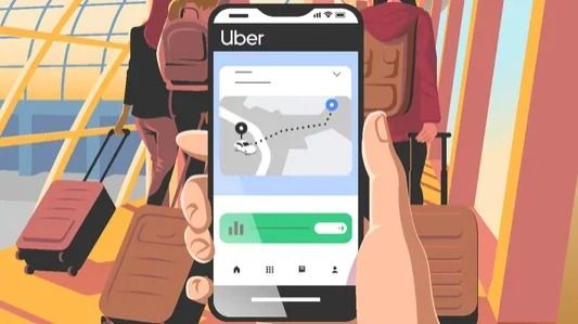 Телефон с открытым приложением Uber. 